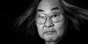 Han Dae-soo portrait black and white photograph Korean folk music pioneer long hair glasses contemplative expression