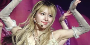 Chaeyoung solo debut performance showcasing blonde hair styling and stage presence