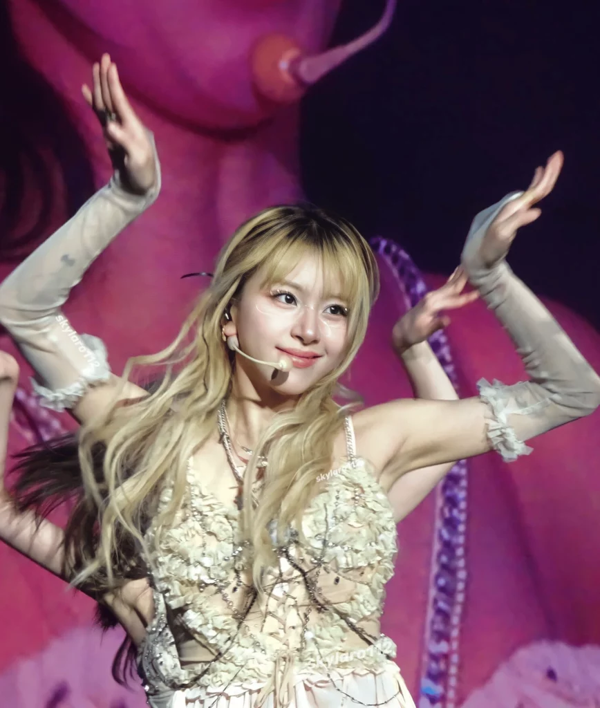 Chaeyoung solo debut performance showcasing blonde hair styling and stage presence